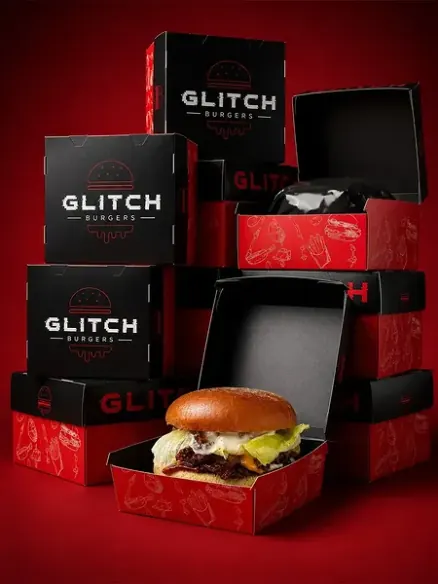 Instagram post: a stack of Glitch Burgers boxes